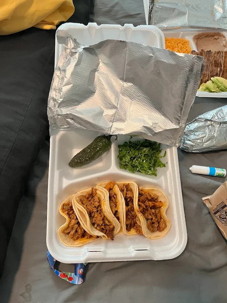 Al Pastor Mini Taco Plate - Tender al pastor pork with fresh pineapple, cilantro, and onion on warm corn tortillas